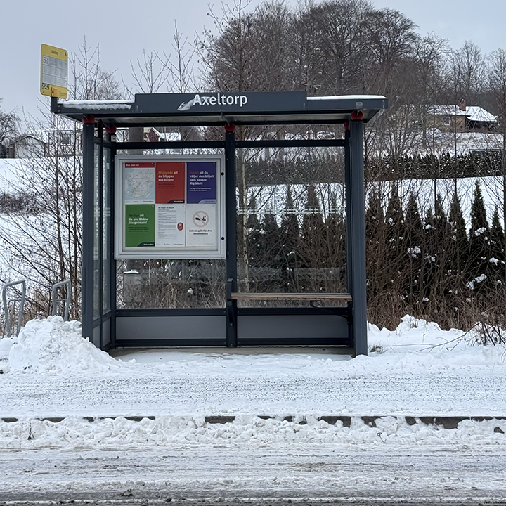 A sheltered bus stop in snowy Sweden